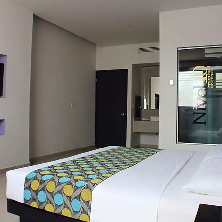 Nivel 10 Hotel Манзанило Екстериор снимка